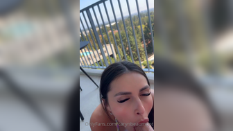 Caryn Beaumont Giving Deep Blowjob to a Fanboy While Wearing Tight Bikini on Balcony Onlyfans Video