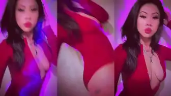 "Petite Asian Girl with Tattoos in Red Lingerie"