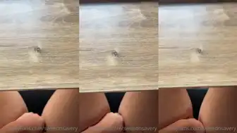 sweednsavery rubbing pussy under the table in this OnlyFans video