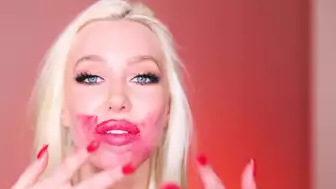 TaraBabcock Blonde Shows Off Her Assets in a Black Bondage Outfit Video