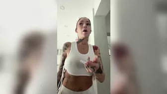 Bhad Bhabie Teases in a Tight Bikini and White Outfit in Seductive Video