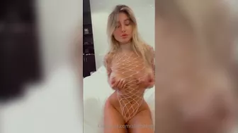 Stefbabyg in Nude Fishnet Teasing Her Tight Ass and Big Boobs in Seductive Video