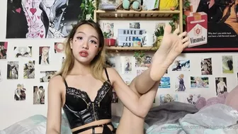 Tiny Hakka In Black Dress Licking Her Feet