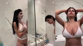 Mia Khalifa Teases in See Thru Tank Top During Steamy Nude Shower Show